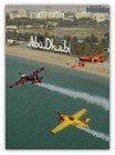 :: Pulse para Ampliar :: Kirby Chambliss (USA/avión azul) en un Edge 450, Nigel Lamb (UK/amarillo) en un MX2 y Nicolas Ivanoff (FR/ naranja) en su Extra 300SR sobrevuelan en formación Abu Dhabi