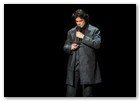 :: Pulse para Ampliar :: Actor Benicio Del Toro recites "Candidate" by Joy Division during the G-Star Fall 2009 Fashion Show at the Hammerstein Ballroom on February 17, 2009 in New York City.