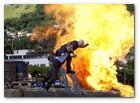 :: Pulse para Ampliar :: First look from the set of Sylvester Stallone's "The Expendables," actors Eric Roberst (left) and Cold Stone Steve Austin (right) in action on in Mangaratiba, Brazil. Photo by Karen Ballard