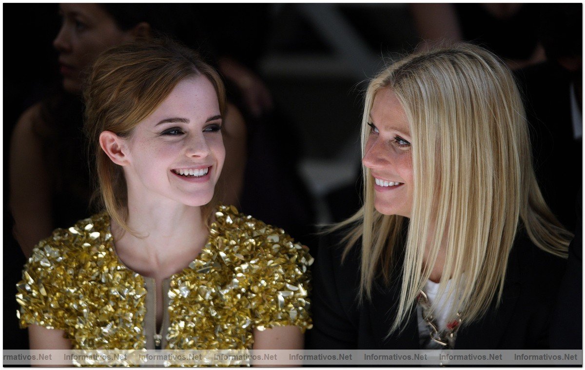 Emma Watson and Gwyneth Paltrow dressed in Burberry watch from the front row at the Burberry Prorsum Spring/Summer 2010 Show