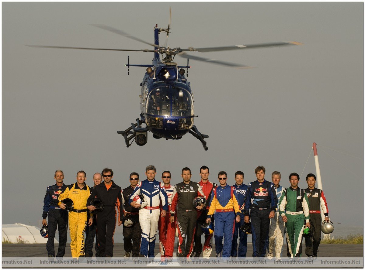 All 15 of the Red Bull Air Race Pilots are filmed from a helicopter as they participate in a promotional television shoot ahead of the fifth round of the 2009 Red Bull Air Race World Championship  in Porto, Portugal,  September 9th,  2009.  They are from left to right, Hungarian Pilot Peter Besenyei, British Pilot Nigel Lamb, Spanish Pilot Alejandro Maclean, French Pilot Nicolas Ivanoff, United States Pilot Mike Mangold, British Pilot Paul Bonhomme, Canadian Pilot Pete McLeod , Austrian Pilot Hannes Arch, German Pilot Matthias Dolderer, Australian Pilot Matt Hall, Russian Pilot Sergey Rakhmanin, United States Pilot Kirby Chambliss, South African Pilot Glen Dell, United States Pilot Michael Goulian, Japanese Pilot Yoshihide Muroya. 