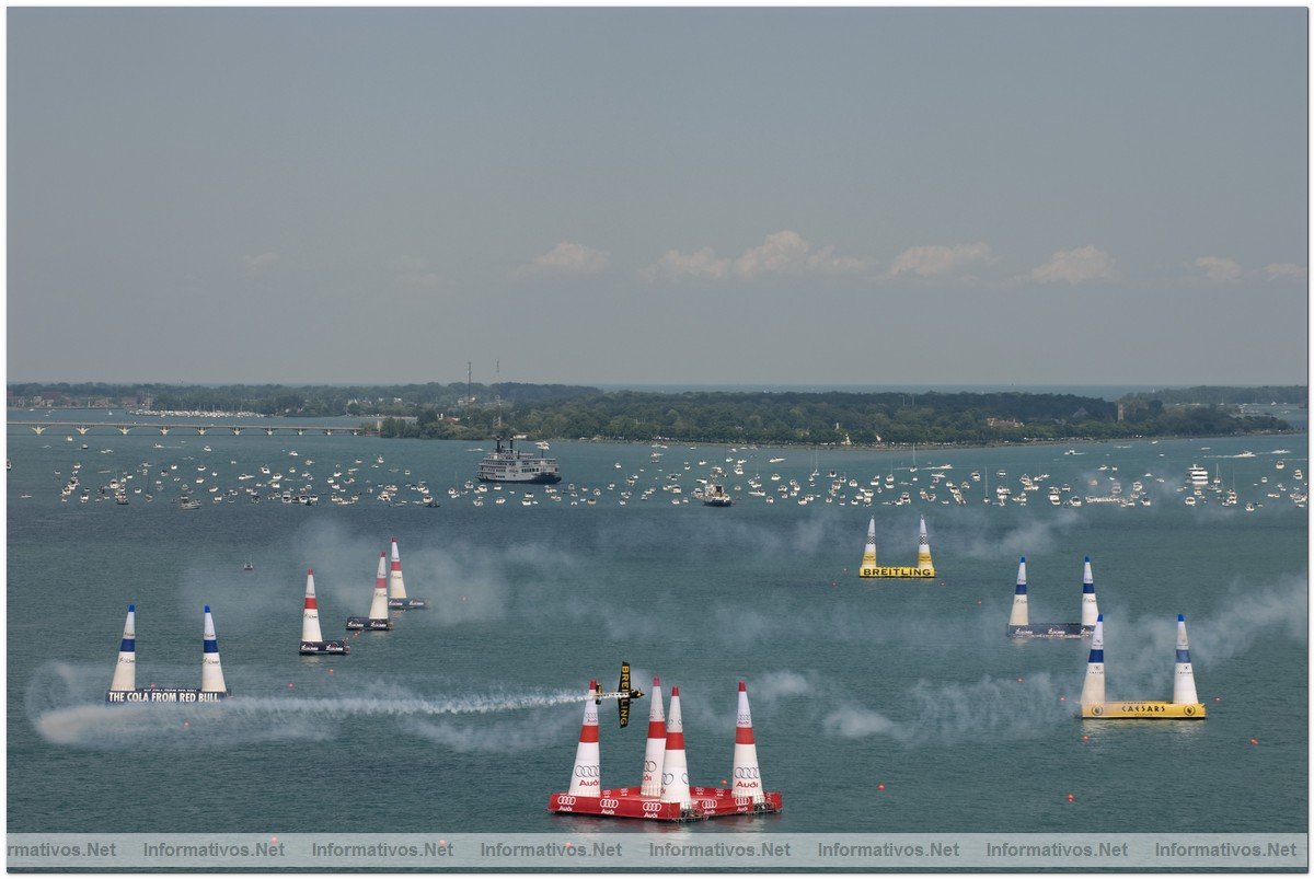British Pilot Nigel Lamb competes in the race session at the third round of the 2009 Red Bull Air Race World Championship  in Windsor, Canada,  June  14, 2009. Spectators watch the race from their boats on the Detroit River.