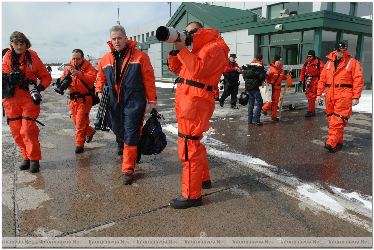 March 29, 2008: Syndey, Nova Scotia: Nigel Barker, world renowed photographer, pauses to take a photograph before heading out to the ice floes to document Canada's commercial seal hunt.
