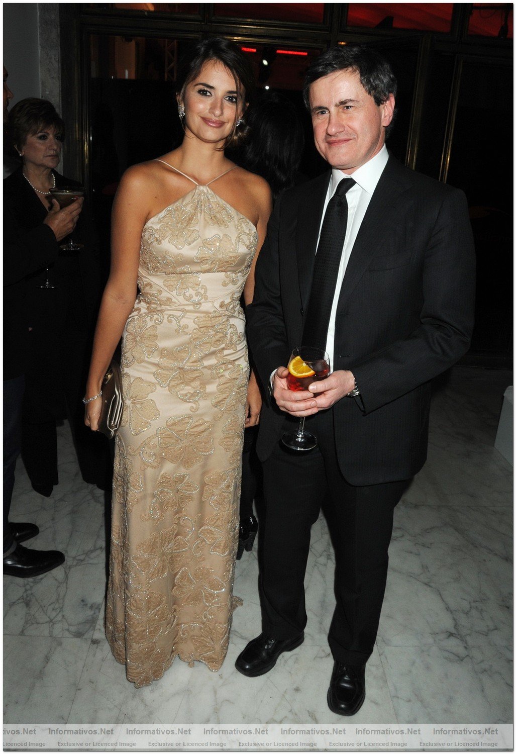 ROME - JANUARY 13:  Penelope Cruz with the Mayor of Rome Gianni Alemanno attend the Rome Premiere Party of 'NINE' co-hosted by Martini, at the Martini Terrazza on January 13, 2010 in Rome, Italy.
