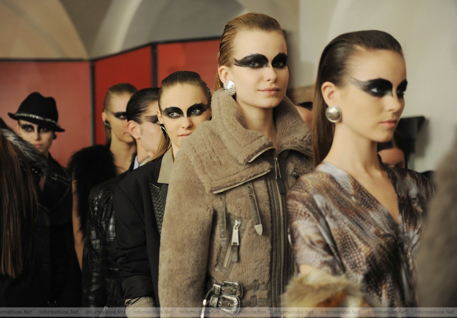 MILAN, ITALY - FEBRUARY 26:  Models prepare backstage prior the Philipp Plein fashion show as part of  Milan Fashion Week Womenswear Autumn/Winter 2011  on February 26, 2011 in Milan, Italy.  (Photo by Stefania D'Alessandro/Getty Images)