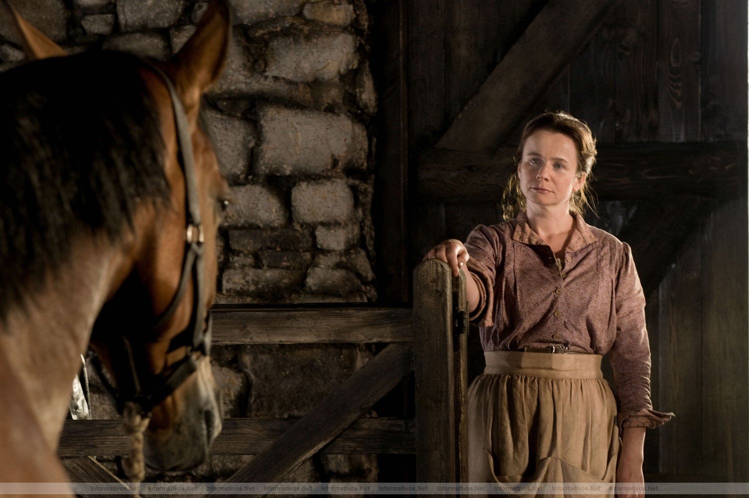 Rosie Narracott (Emily Watson) looks upon Joey with admiration in a scene from DreamWorks Pictures' "War Horse", director Steven Spielberg's epic adventure and an unforgettable odyssey through courage, friendship, discovery and wonder.