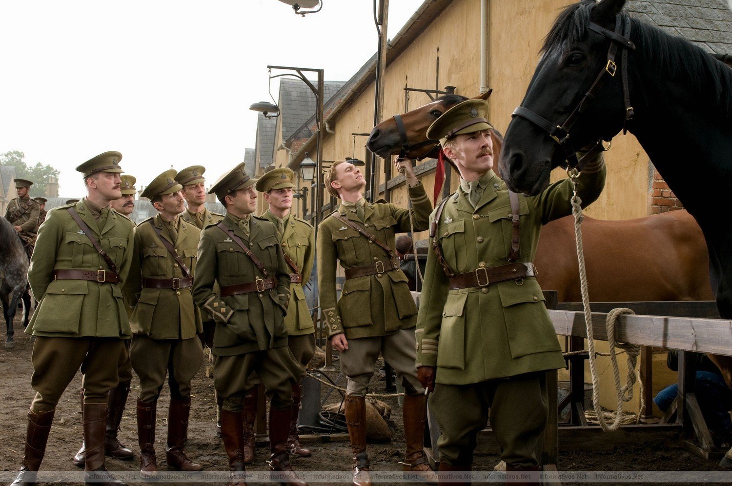 Captain Nicholls (Tom Hiddleston) with Joey (left) and Major Stewart (Benedict Cumberbatch) with Topthorn (right) are featured in this scene at the Army Stables in DreamWorks Pictures' "War Horse", director Steven Spielberg's epic adventure set against a sweeping canvas of rural England and Europe during the First World War