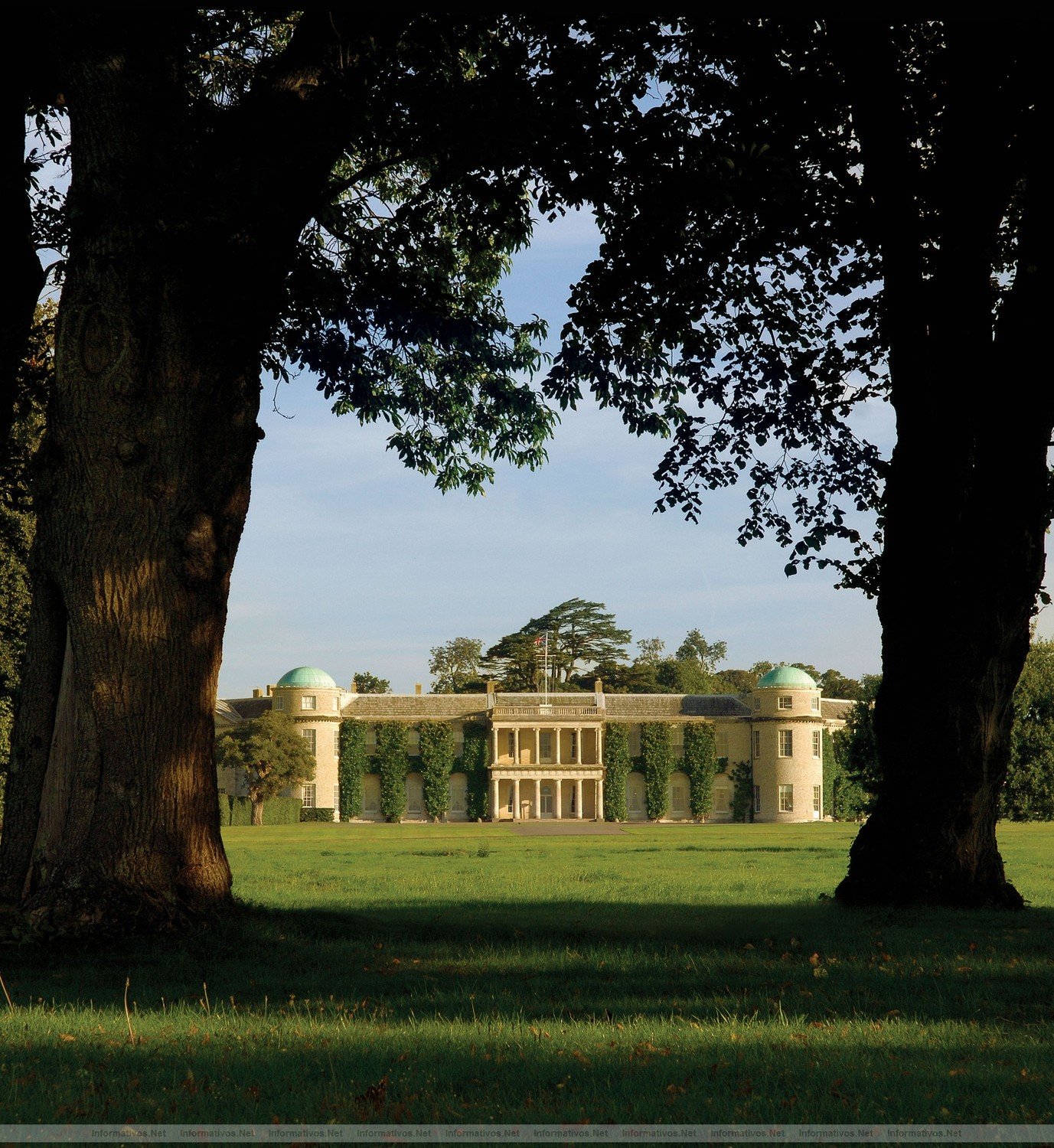 Goodwood House through the trees