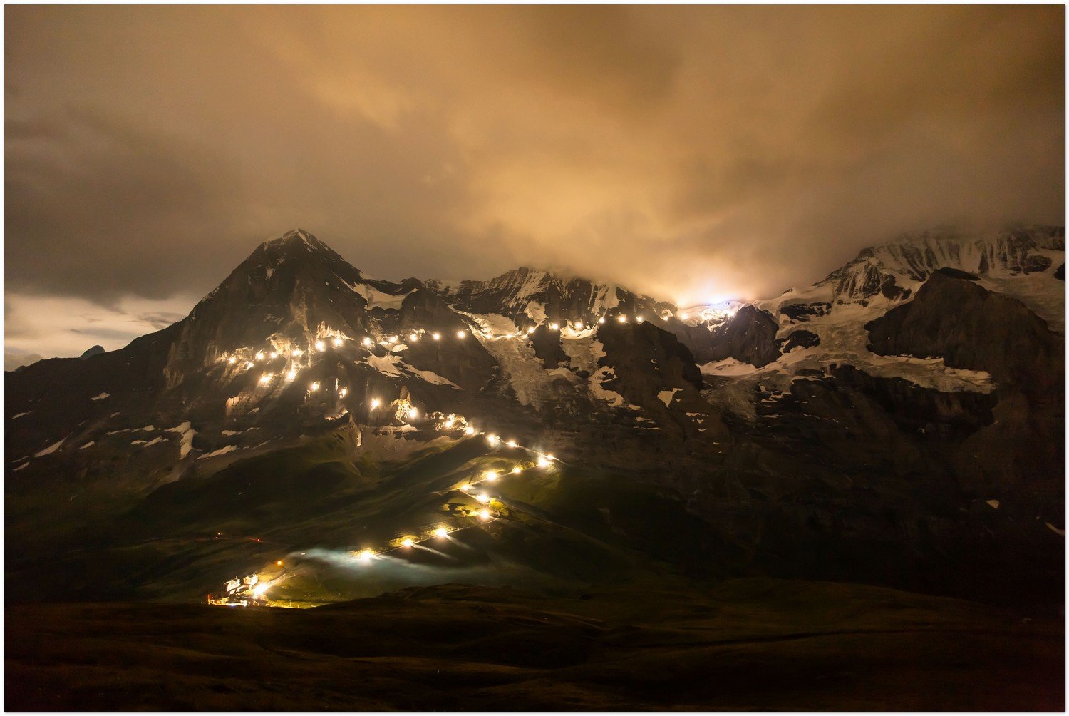 The Jungfrau Railway was one hundred years old on 1 August 2012. To celebrate the centenary, 48 flares were lit on the north walls of the Eiger and Mšnch showing the route of the historic railway through the two mountains