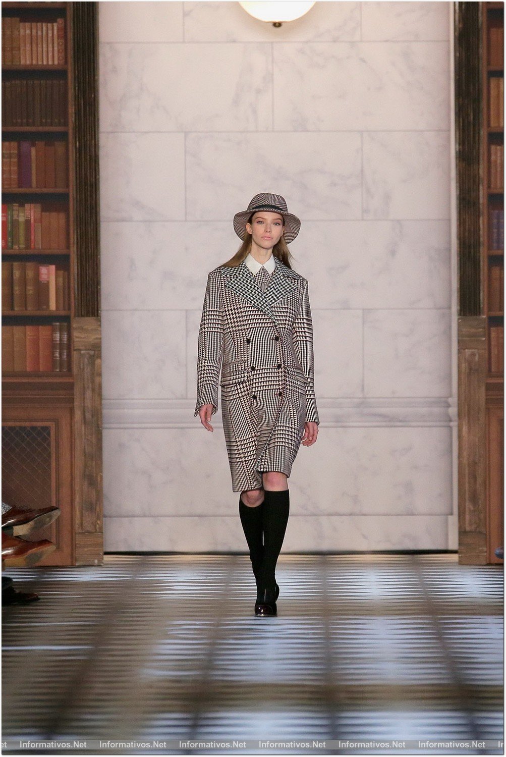 NEW YORK, NY - FEBRUARY 10:  A model walks the runway at the Tommy Hilfiger Fall 2013 Women's Collection fashion show during Mercedes-Benz Fashion Week at the Park Avenue Armory on February 10, 2013 in New York City.