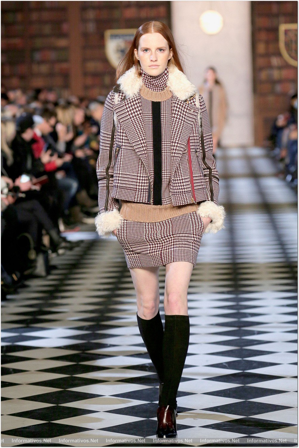 NEW YORK, NY - FEBRUARY 10:  A model walks the runway at the Tommy Hilfiger Fall 2013 Women's Collection fashion show during Mercedes-Benz Fashion Week at the Park Avenue Armory on February 10, 2013 in New York City.
