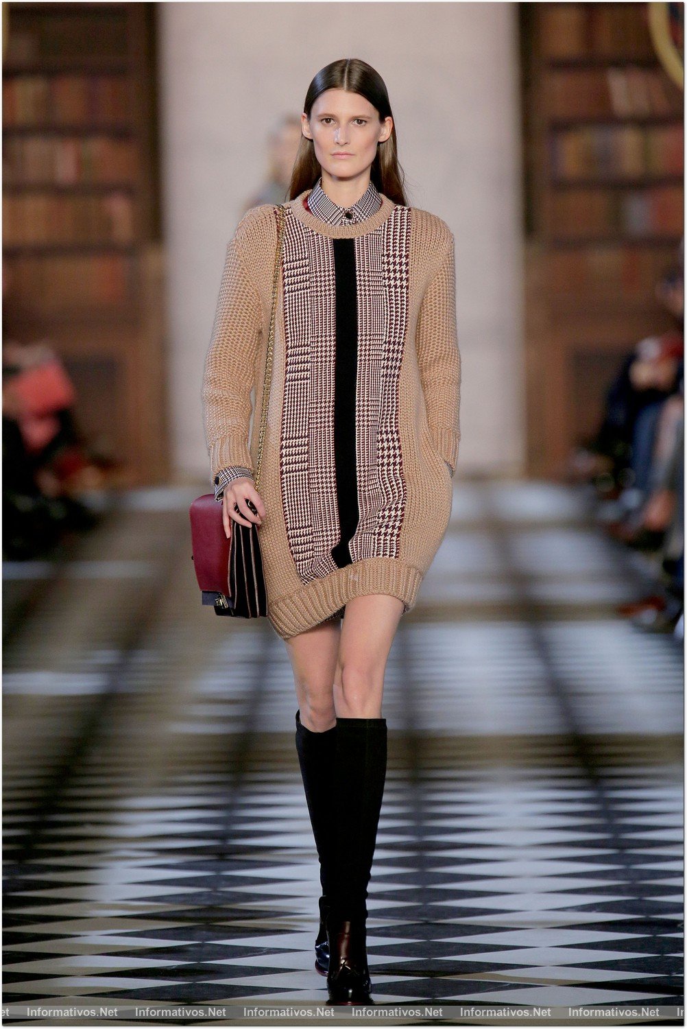 NEW YORK, NY - FEBRUARY 10:  A model walks the runway at the Tommy Hilfiger Fall 2013 Women's Collection fashion show during Mercedes-Benz Fashion Week at the Park Avenue Armory on February 10, 2013 in New York City.
