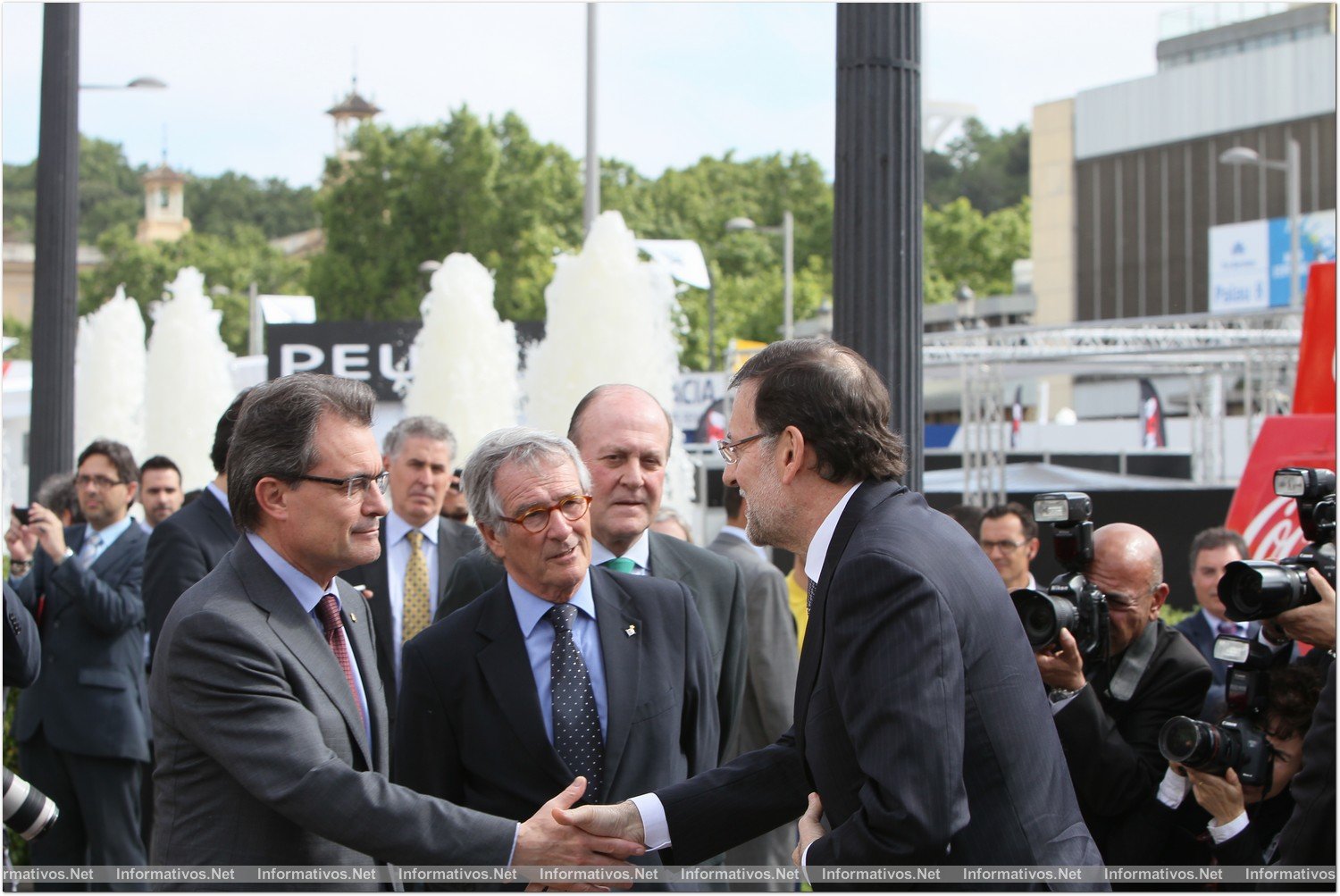 BCN9MAY01.- Salón Internacional del Automóvil. Artur Mas, President Generalitat; Xavier Trías, alcalde de Barcelona; y Mariano Rajoy, Presidente del Gobierno de España