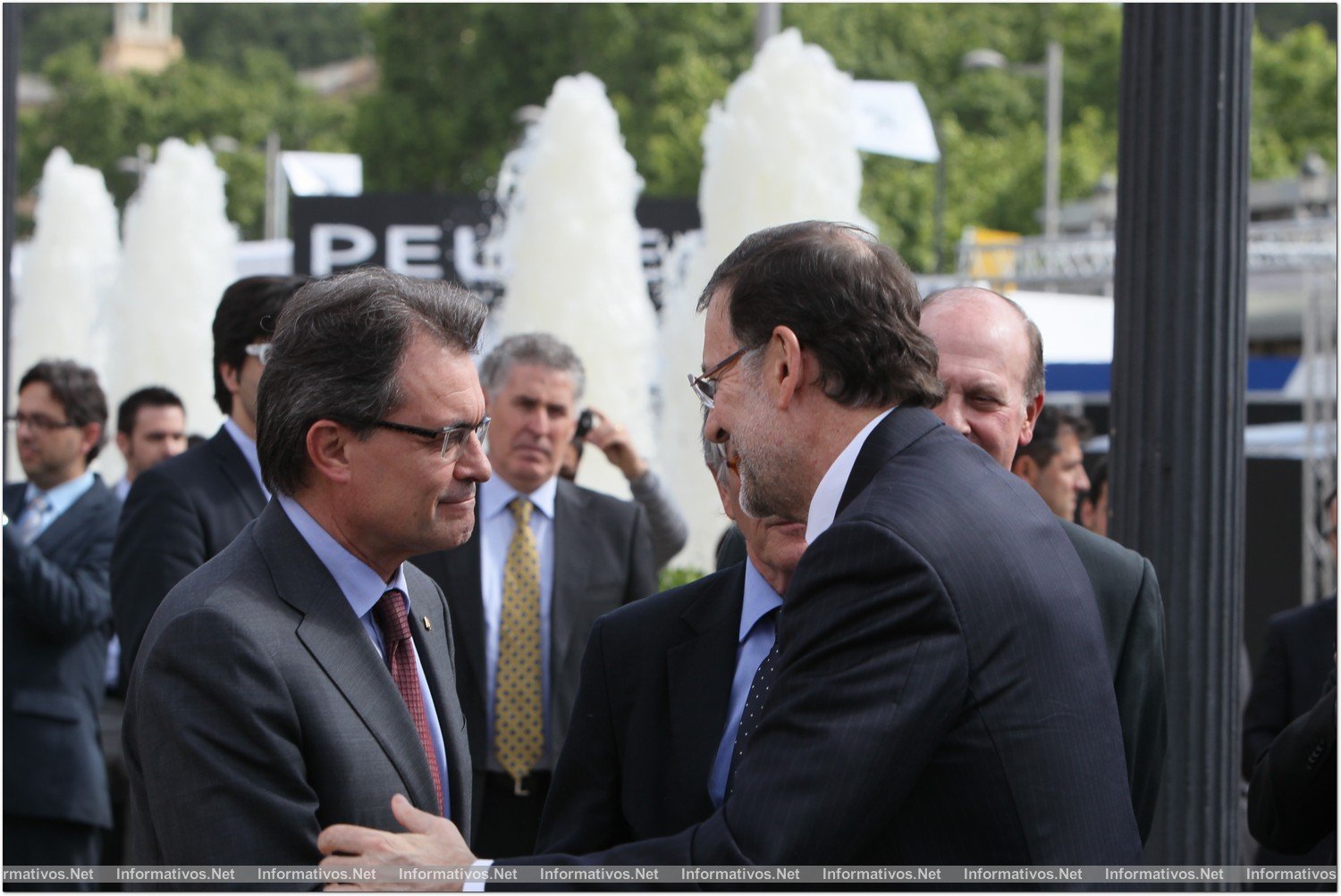 BCN9MAY01.- Salón Internacional del Automóvil. Artur Mas, President Generalitat; Xavier Trías, alcalde de Barcelona; y Mariano Rajoy, Presidente del Gobierno de España