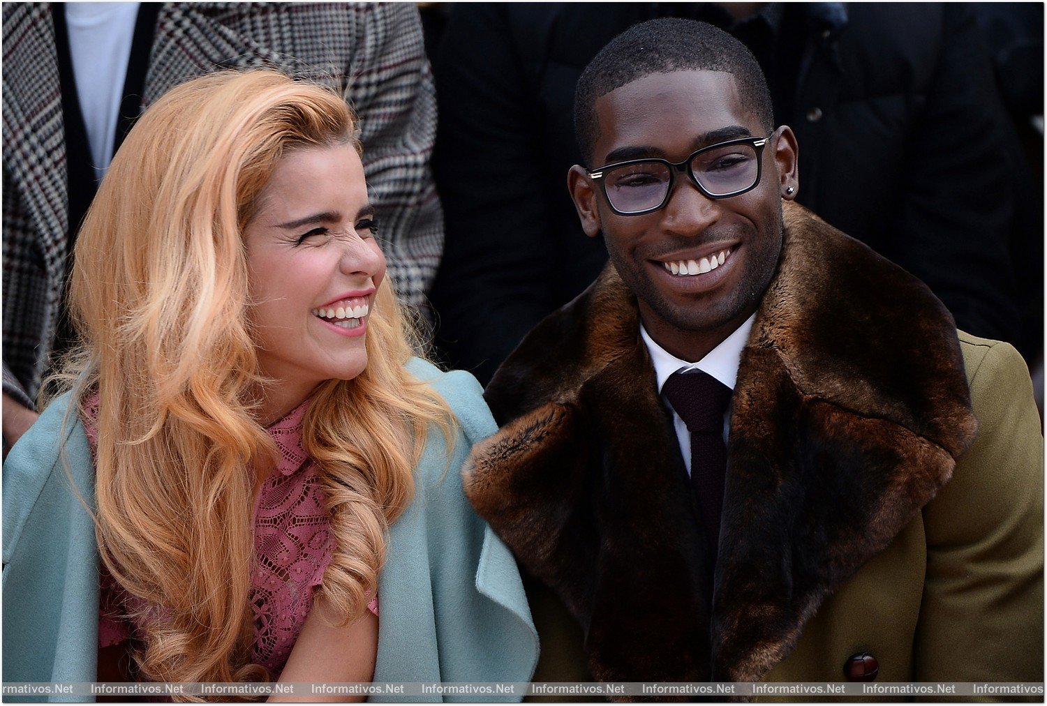 LONDON, ENGLAND - JANUARY 08:  (L-R) Paloma Faith and Tinie Tempah sit in the front row during Burberry AW14 Menswear Show at Kensington Gardens on January 8, 2014 in London, England. 
