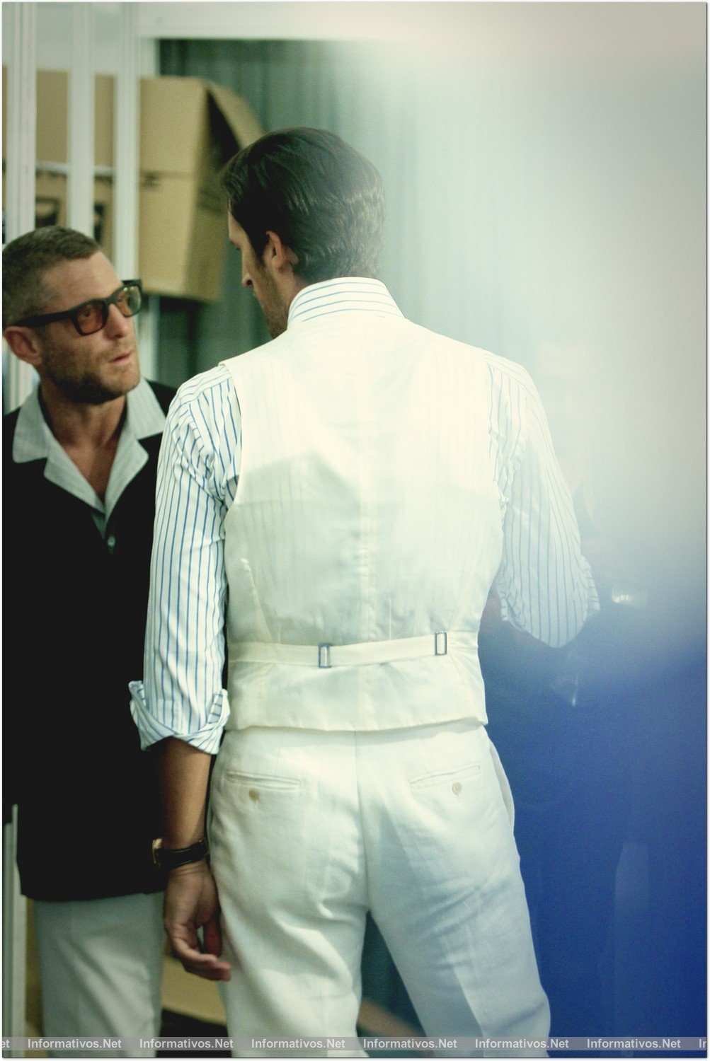 BCN04JUL014.- Rafael Medina, fundador de la marca Scalpers, junto a Lapo Elkann, fundador de la empresa de estilo de vida, Italia Independent, revisando la colección que presentaron en la 080 Barcelona Fashion