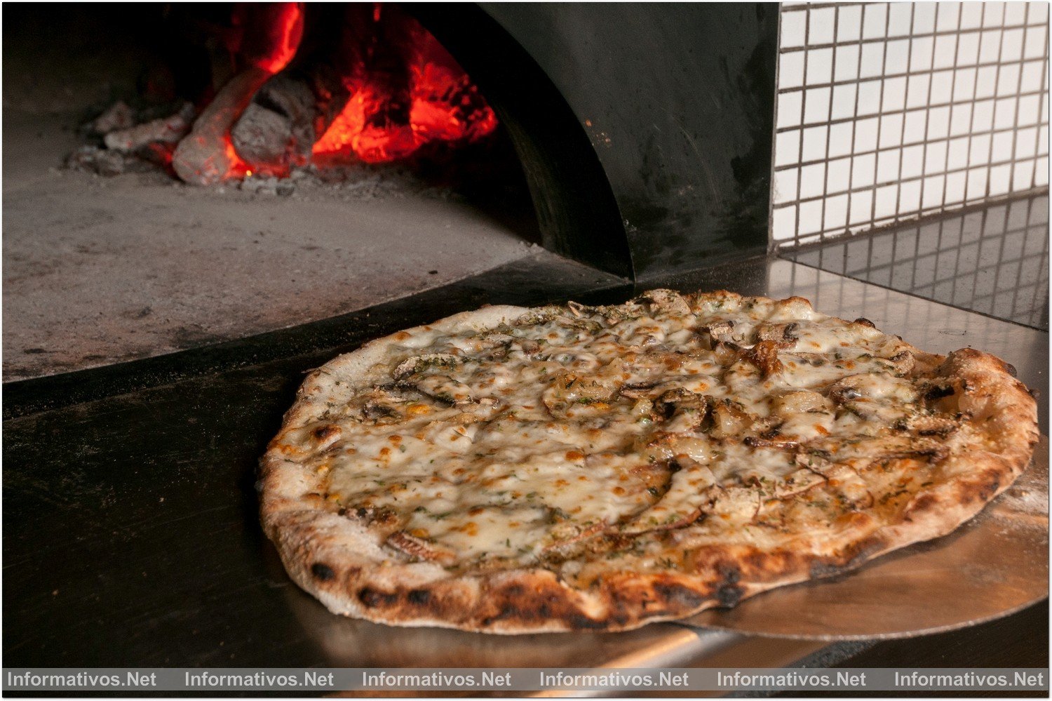 Roostiq: el restaurante de finca del corazón de Chueca. Pizza de champiñones Portobello.
